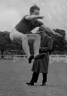 'Bob' Leggatt winning the Long Jump <br/>at the Combined School Sports in 1948.